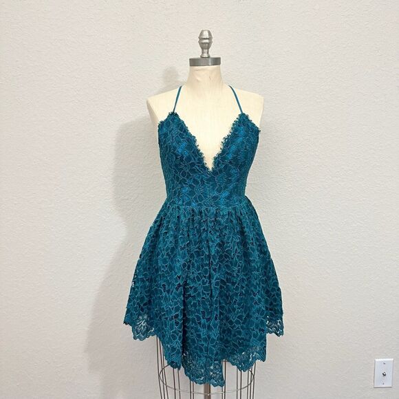 NBD Dresses & Skirts - NWOT NBD REVOLVE Strappy Crossback Lace Mini Dress Fit & Flare Bluish Green